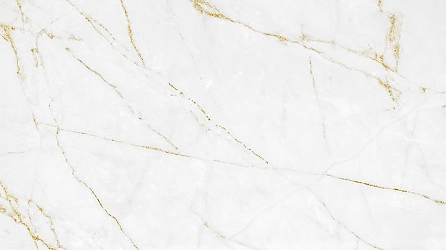 White marble with gold veining design.