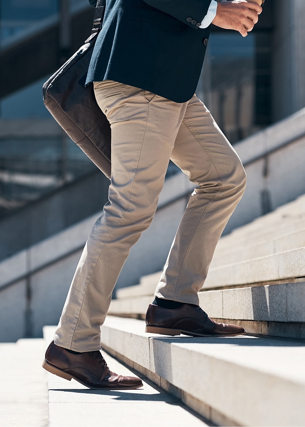Stylish outfit featuring black heels and handbag.