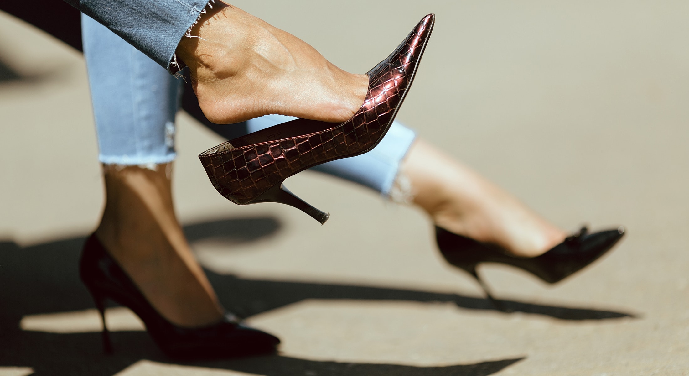 Fashionable high heels on stylish denim.