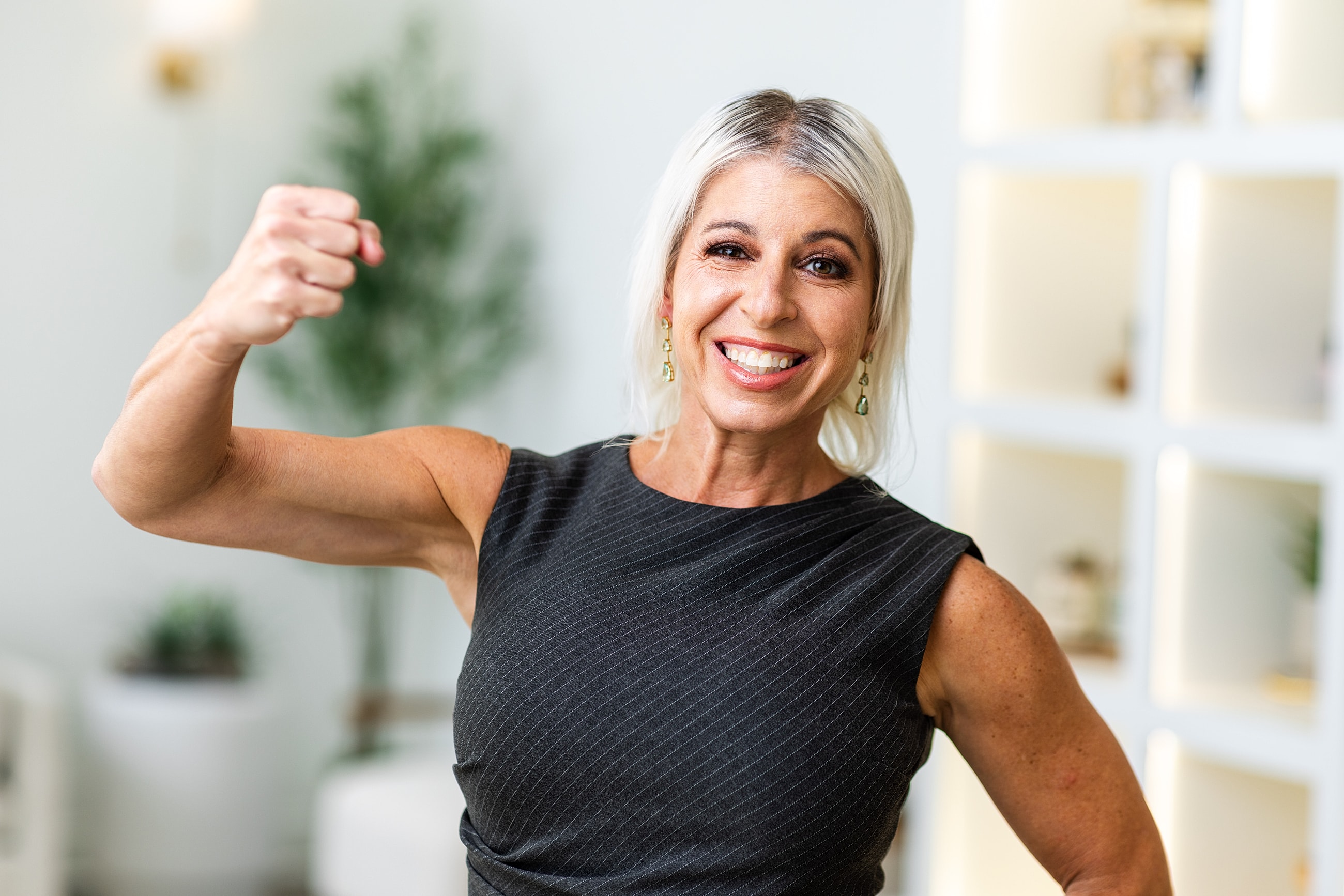 Stylish high heels on a reflective surface.