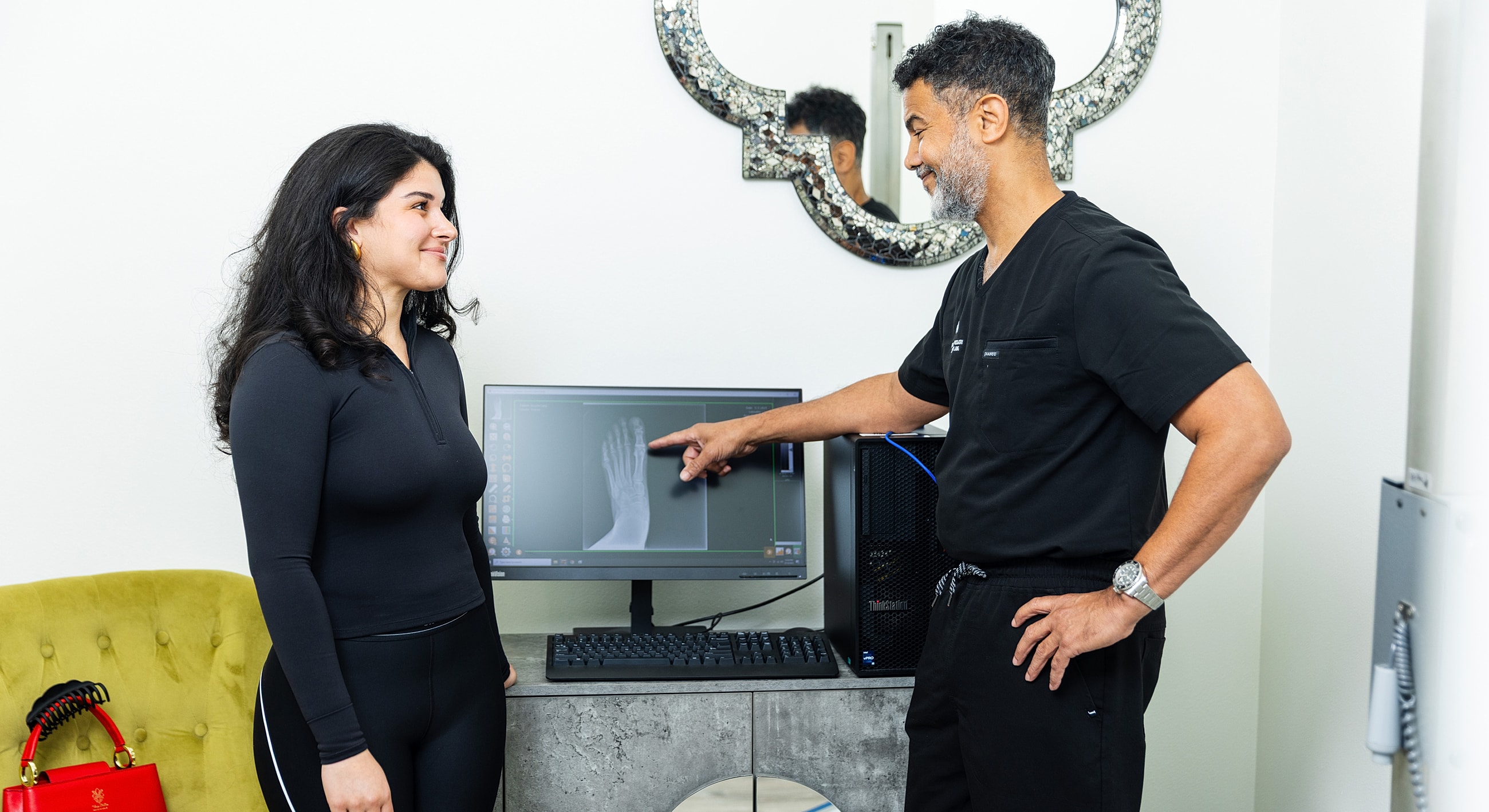 Person stretching on yoga mat indoors.